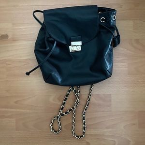 Black backpack with chain straps